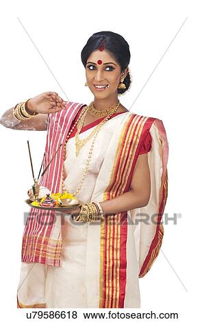 Bengali woman with puja thali View Large Photo Image Stock Photo - Bengali woman with puja thali. Fotosearch