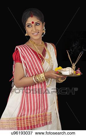 Bengali woman with puja thali  View Large Photo Image Stock Photo - Bengali woman with puja thali . Fotosearch
