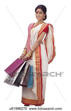 Bengali woman with shopping bags View Large Photo Image Stock Image - Bengali woman with shopping bags . Fotosearch