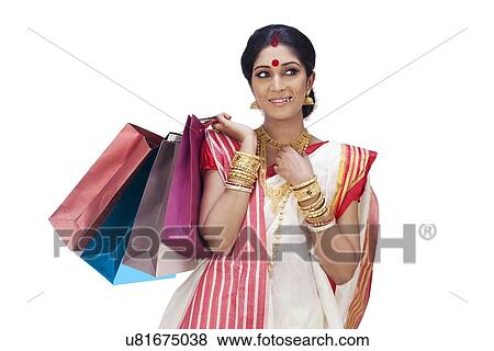 Stock Photo - Bengali woman with shopping bags . Fotosearch