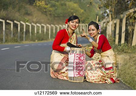 Bihu dancers looking at something View Large Photo Image Stock Photo - Bihu dancers looking at something . Fotosearch