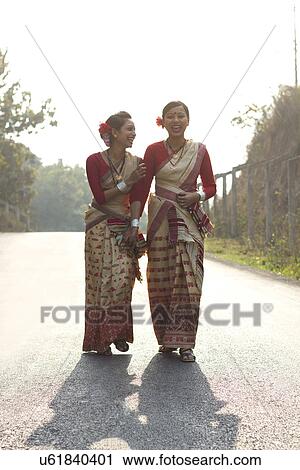 Bihu dancers sharing a laugh View Large Photo Image Stock Image - Bihu dancers sharing a laugh . Fotosearch