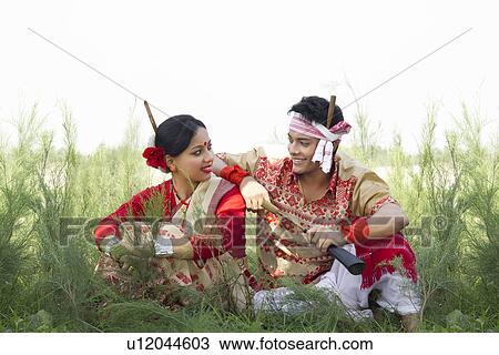 Bihu dancers sitting together View Large Photo Image Stock Image - Bihu dancers sitting together . Fotosearch