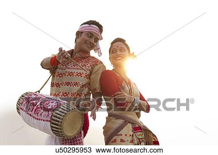 Bihu dancers standing back to back View Large Photo Image Stock Image - Bihu dancers standing back to back . Fotosearch