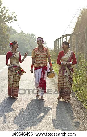 Bihu dancers walking together View Large Photo Image Stock Photograph - Bihu dancers walking together . Fotosearch
