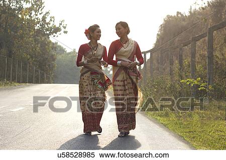 Bihu dancers walking together View Large Photo Image Stock Photography - Bihu dancers walking together . Fotosearch