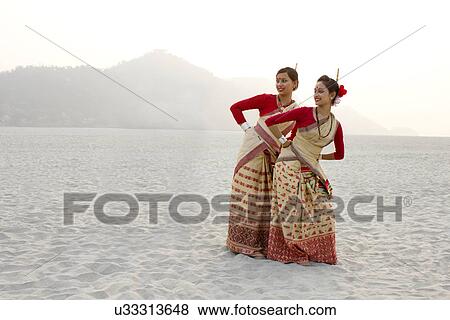 Bihu women dancing View Large Photo Image Stock Photo - Bihu women dancing . Fotosearch