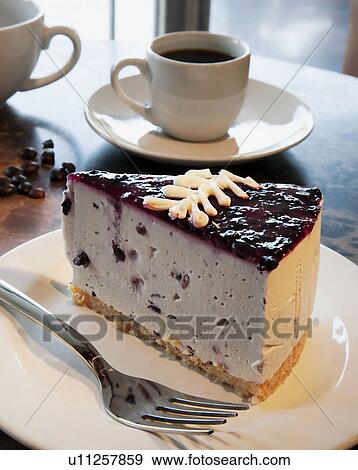 Blueberry cheesecake View Large Photo Image Stock Photo - Blueberry cheesecake . Fotosearch