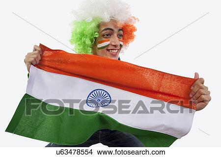 Boy cheering for the Indian team View Large Photo Image Picture - Boy cheering for the Indian team . Fotosearch