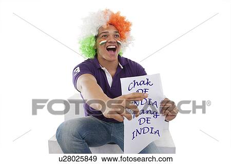 Boy with a wig cheering View Large Photo Image Stock Photo - Boy with a wig cheering . Fotosearch