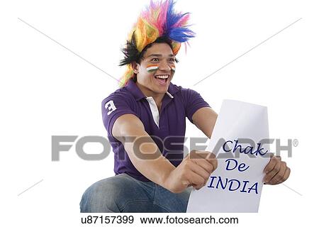 Stock Photo - Boy with a wig cheering . Fotosearch