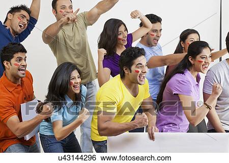 Stock Photograph - Boys and girls cheering . Fotosearch