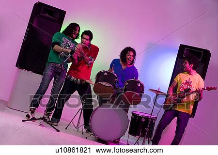Boys of a rock band enjoying themselves View Large Photo Image Stock Image - Boys of a rock band enjoying themselves . Fotosearch