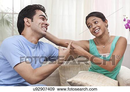 Stock Photo - Brother and sister fighting. Fotosearch