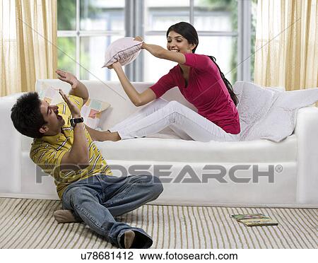 Brother and sister having fun View Large Photo Image Stock Image - Brother and sister having fun . Fotosearch