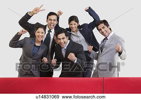 Business executives cheering during cricket match View Large Photo Image Stock Photo - Business executives cheering during cricket match . Fotosearch
