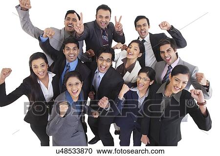 Stock Image - Business executives cheering . Fotosearch