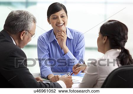 Business executives in healthy discussion View Large Photo Image Stock Image - Business executives in healthy discussion . Fotosearch
