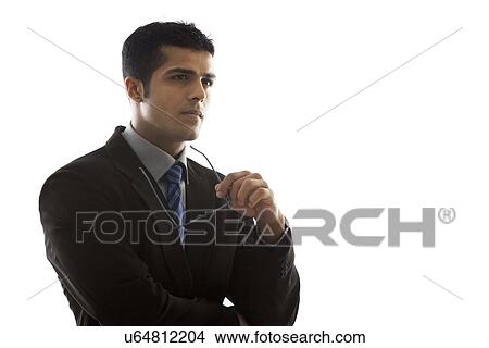 Business man holding glasses over white background View Large Photo Image Picture - Business man holding glasses over white background . Fotosearch