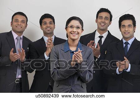 Business people applauding View Large Photo Image Stock Photo - Business people applauding . Fotosearch