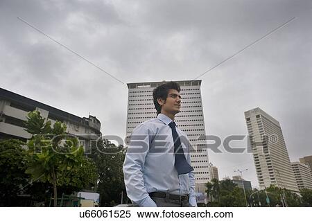 Businessman in the city View Large Photo Image Stock Photography - Businessman in the city . Fotosearch