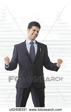 Businessman rejoicing View Large Photo Image Stock Image - Businessman rejoicing . Fotosearch