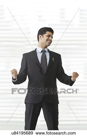 Stock Photo - Businessman rejoicing . Fotosearch