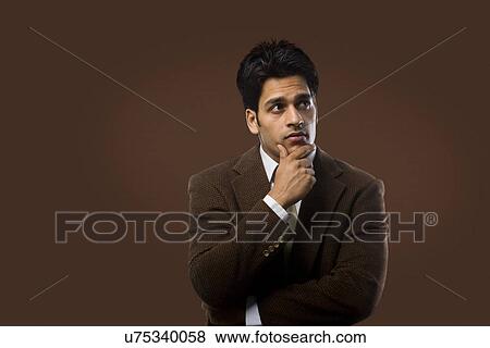 Businessman thinking View Large Photo Image Stock Photo - Businessman thinking . Fotosearch