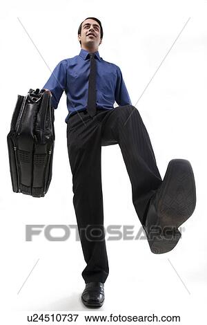 Businessman with a bag View Large Photo Image Stock Photo - Businessman with a bag . Fotosearch