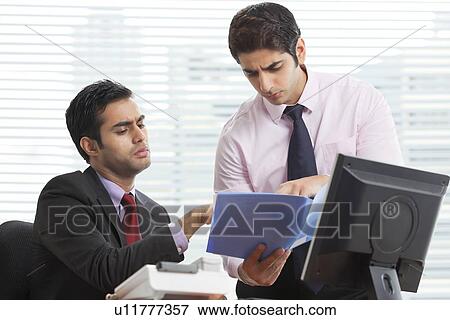 Businessmen in discussion about new project View Large Photo Image Stock Photo - Businessmen in discussion about new project . Fotosearch
