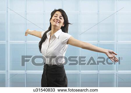Businesswoman enjoying her freedom View Large Photo Image Stock Image - Businesswoman enjoying her freedom . Fotosearch