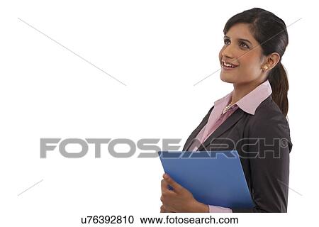 Stock Image - Businesswoman with a file . Fotosearch