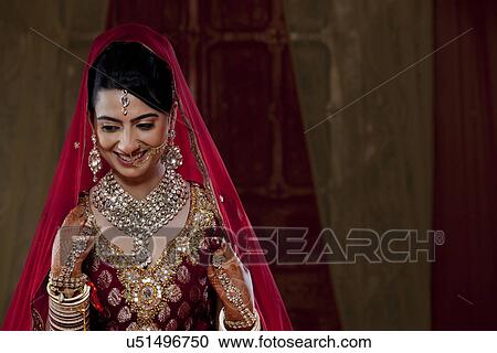 Stock Image - Close-up of a beautiful bride smiling . Fotosearch