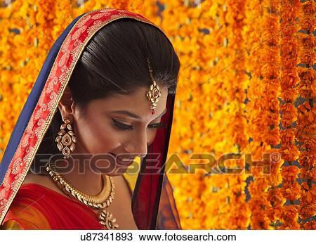 Stock Image - Close-up of a beautiful bride smiling. Fotosearch