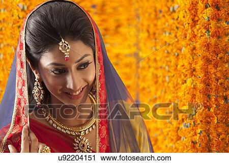 Close-up of a beautiful bride smiling View Large Photo Image Stock Image - Close-up of a beautiful bride smiling. Fotosearch