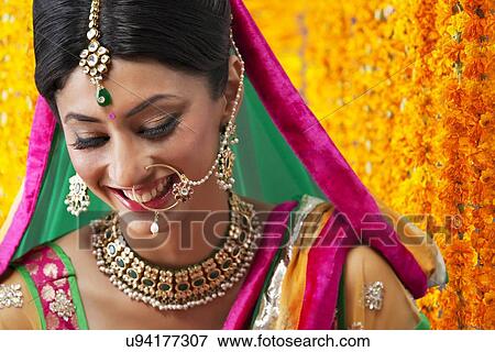 Stock Photo - Close-up of a beautiful bride smiling. Fotosearch