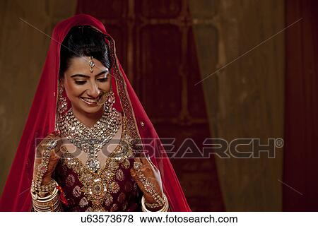 Close-up of a beautiful bride View Large Photo Image Stock Photo - Close-up of a beautiful bride . Fotosearch