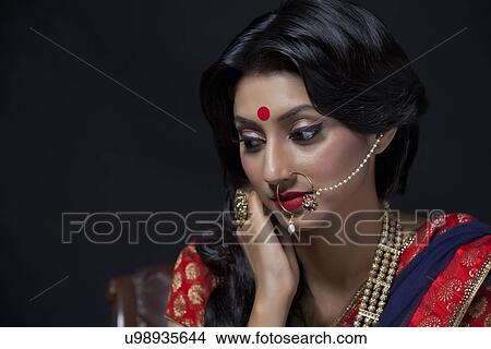 Picture - Close-up of a beautiful bride with jewelery. Fotosearch