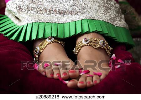 Stock Photo - Close-up of a bride's feet. Fotosearch