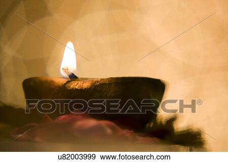 Stock Photo - Close-up of a diya . Fotosearch