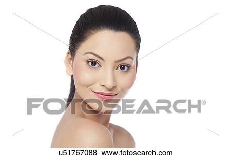 Stock Photo - Close-up of a pretty young woman over white background . Fotosearch