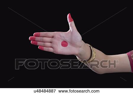 Stock Photo - Close-up of a woman's hand making a Bharatanatyam gesture called Ardhachandra on black background. Fotosearch