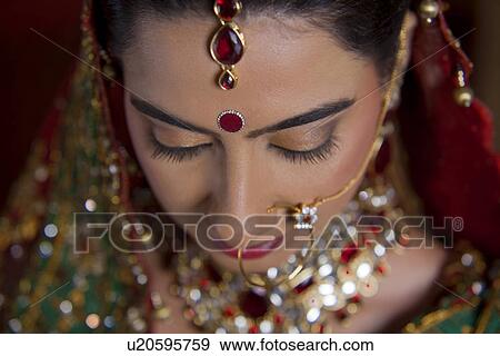Stock Photo - Close up of beautiful bride's bindi . Fotosearch
