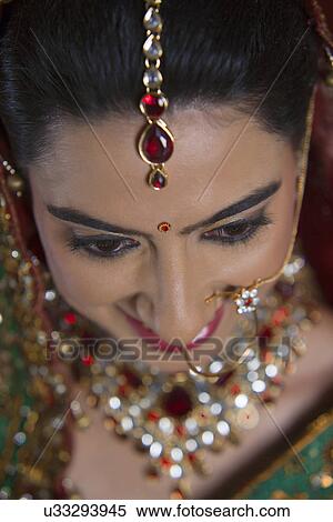 Stock Photography - Close up of beautiful Indian bride's forehead . Fotosearch