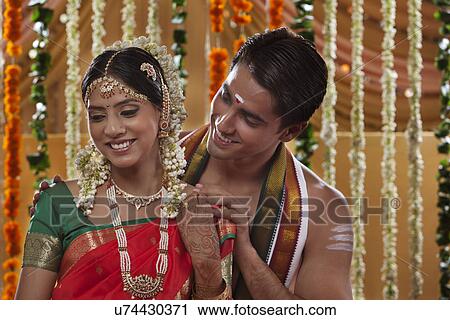 Close-up of beautiful young couple spending time together View Large Photo Image Stock Image - Close-up of beautiful young couple spending time together . Fotosearch