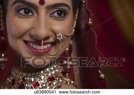 Close up of beautiful young Indian bride View Large Photo Image Stock Image - Close up of beautiful young Indian bride . Fotosearch