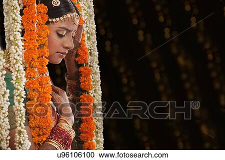 Stock Image - Close-up of bride with eyes closed . Fotosearch