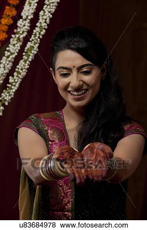Close-up of bride's hand with henna tattoo View Large Photo Image Stock Photo - Close-up of bride's hand with henna tattoo . Fotosearch