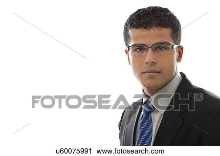Stock Image - Close-up of confident businessman in glasses over white background . Fotosearch