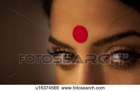 Close-up of eye and bindi of a woman View Large Photo Image Stock Photo - Close-up of eye and bindi of a woman . Fotosearch
